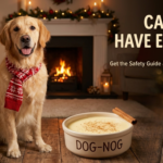 A Golden Retriever wearing a holiday scarf sitting next to a bowl of dog-safe eggnog ("Dog-Nog") in a festive living room. Overlay text reads: "Can Dogs Have Eggnog? Get the Safety Guide & a Vet-Approved Recipe."